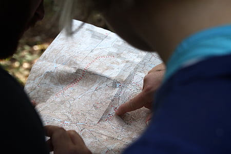 person holding world map thumbnail