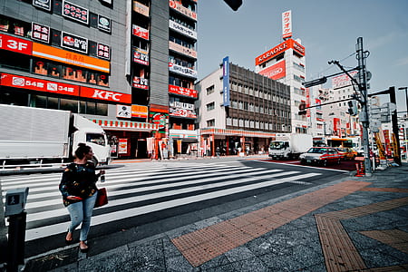 woman crossing at the pedestrian lane thumbnail