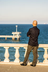 man stand beside terrace thumbnail