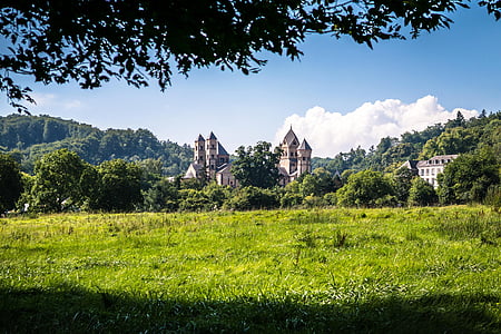 concrete structures surrounded by trees thumbnail