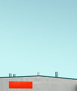 gray and beige concrete building during daytime thumbnail
