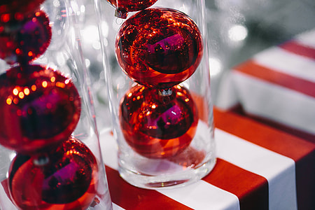 Red Christmas baubles packed in plastic tubes thumbnail
