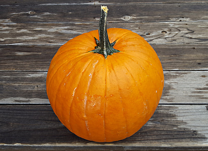 orange squash on wooden surface thumbnail