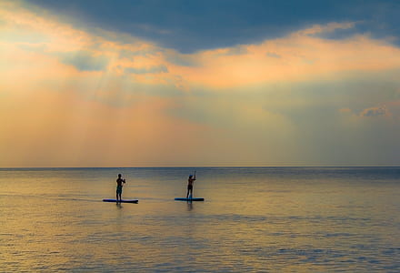 two people on paddle boards thumbnail