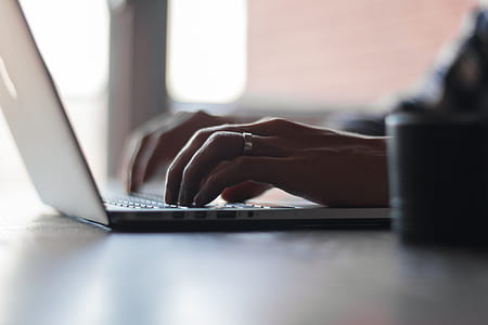 person typing on black laptop computer thumbnail