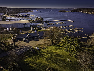 aerial photography of buildings and sea at daytime thumbnail
