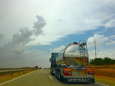 stainless steel oil tanker on asphalt road thumbnail
