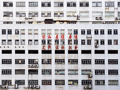 white concrete high-rise building at daytime thumbnail
