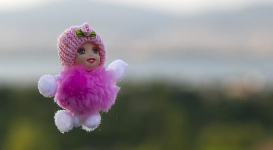 pink and white doll thumbnail