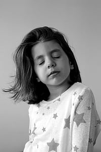 grayscale photography of girl close her eyes thumbnail