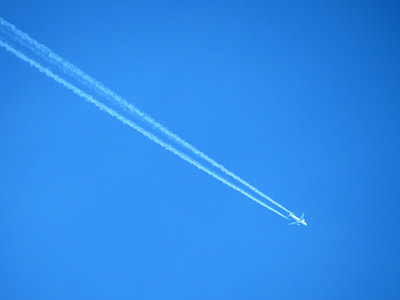 white airplane in the sky thumbnail