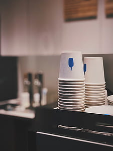 selective focus photography of white disposable cups thumbnail