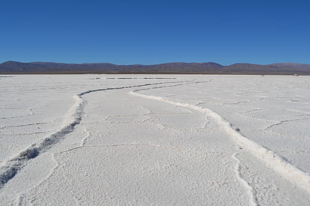 white snow field during daytime thumbnail