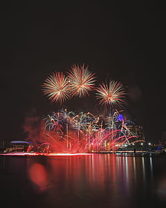 fireworks show near body of water thumbnail