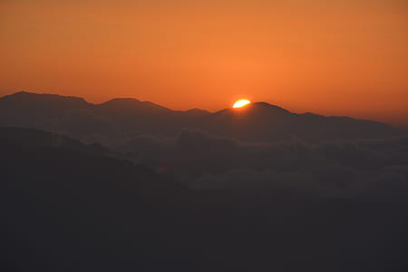 photo of mountain covering sun thumbnail
