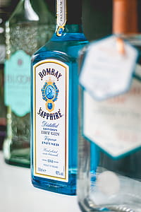 Shallow Focus Photography of Bombay Sapphire Dry Gin Bottle thumbnail