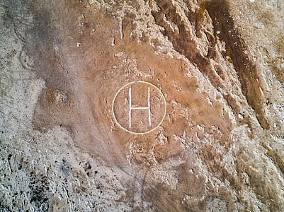 white letter H decor on cliff thumbnail
