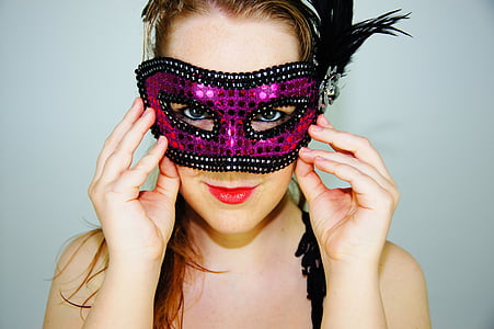 photography of woman wearing purple and black masquerade mask thumbnail