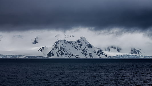 glacier mountain near sea thumbnail