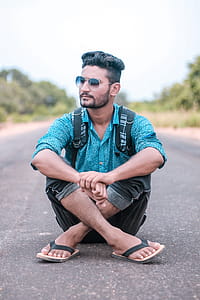 Man Sitting On Road thumbnail