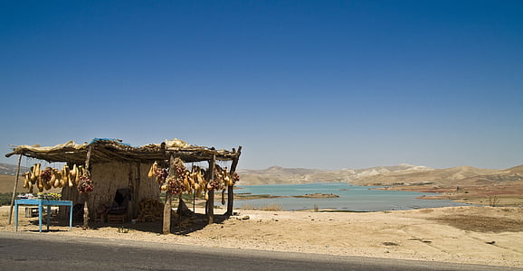 store beside highway thumbnail