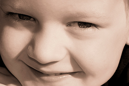 smiling toddler taking selfie thumbnail