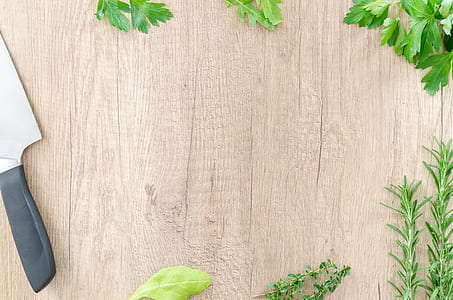 flat lay photography of cleaver knife and herbs thumbnail