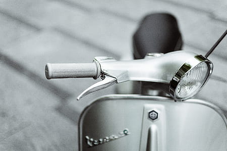 Close-Up Photo of Vespa Motorcycle thumbnail