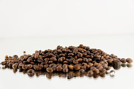 coffee beans on white surface thumbnail