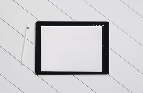flat lay photography of black iPad thumbnail