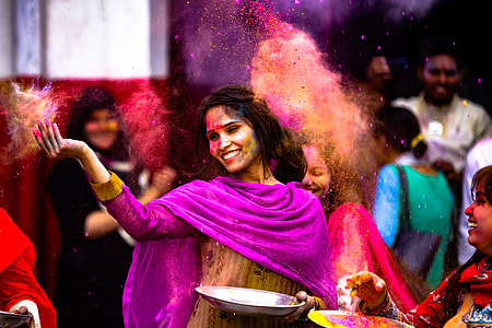 woman in pink dress and dancing in concert thumbnail