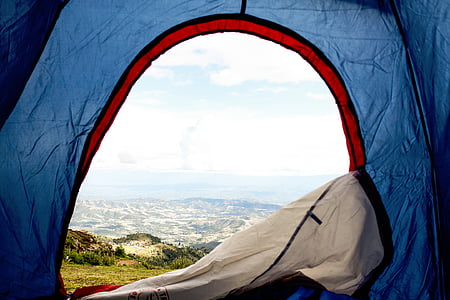 person in blue tent thumbnail