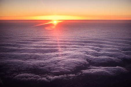 body of water during sunset thumbnail