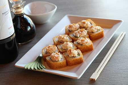 rectangular white ceramic platter with sliced of spread sandwiches thumbnail