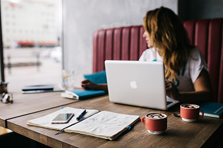 Young woman working in a cafe thumbnail