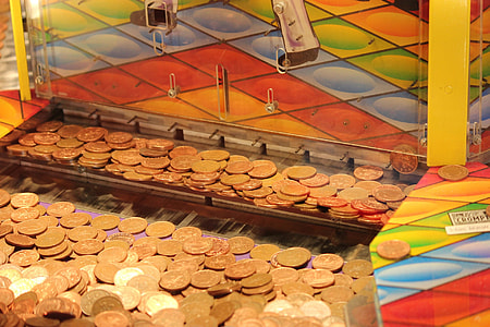 assorted gold-colored coins thumbnail