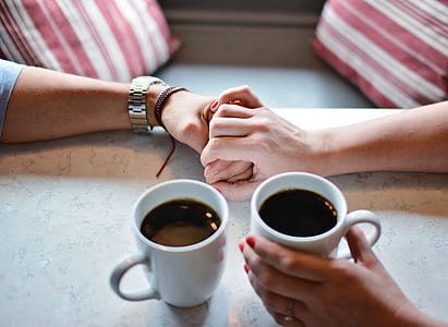 man and woman holding each other's hands thumbnail