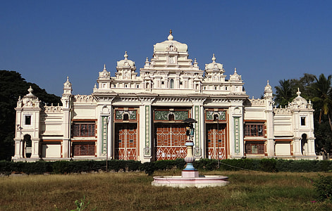 white and brown concrete castle surrounded by trees thumbnail
