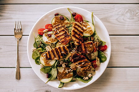 Grilled Dish With Vegetables on Round White Ceramic Plate thumbnail