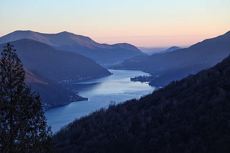 river in between mountain landscape photo thumbnail