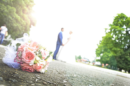 selective focus photo of wedding flower on ground thumbnail