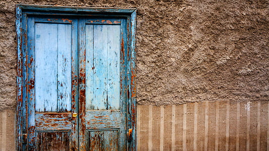 close blue wooden door thumbnail