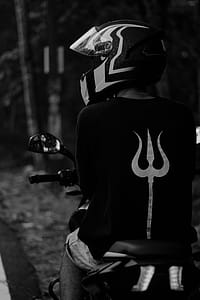 Grayscale Photography of Person Riding Motorcycle thumbnail