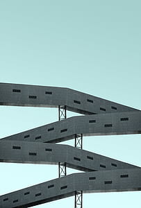 architectural photography of black and gray building thumbnail
