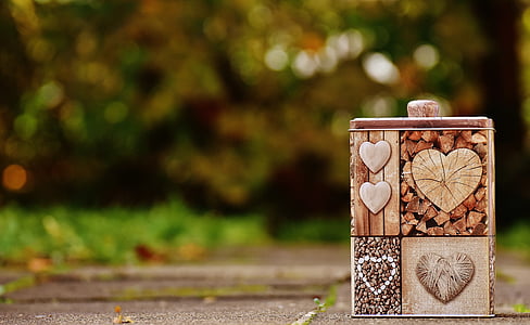 close-up photo of brown wooden box with heart painted thumbnail