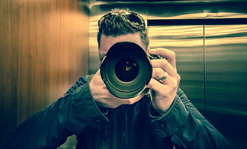 man taking photo thumbnail