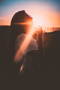 Woman Wearing White Top and Gray Framed Sunglasses thumbnail