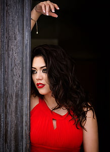 woman wearing red key hole tank top thumbnail