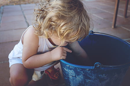toddler looking in bucket thumbnail