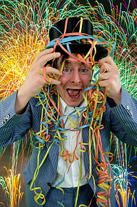 man wearing coat and hat while making face thumbnail